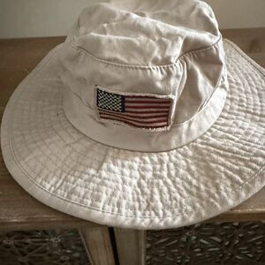 Panama Jack sun blocking USA flag hat